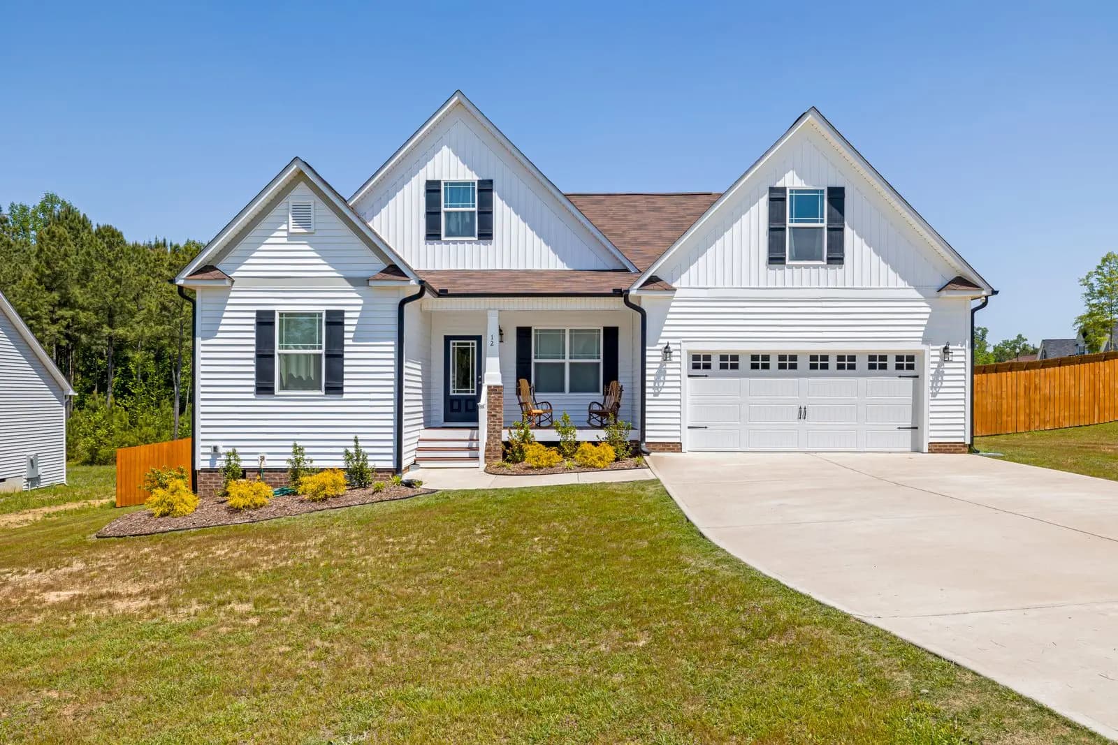 A new concrete driveway at a suburban home