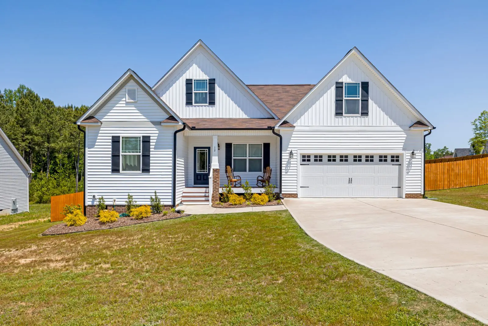 A new concrete driveway at a suburban home