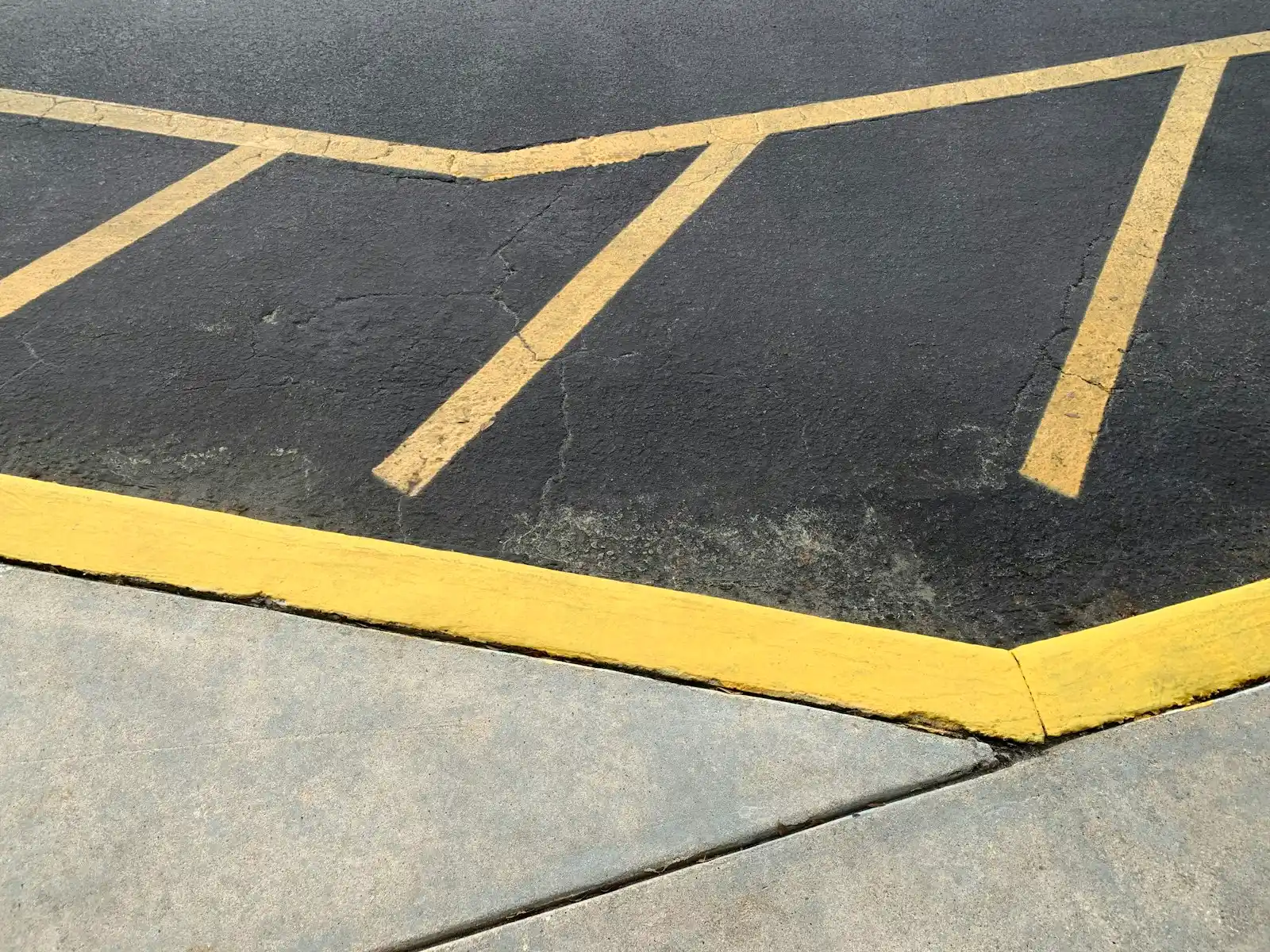 Fresh yellow striping on a parking lot